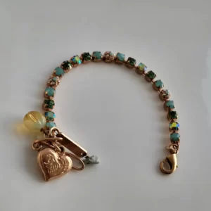 צמיד "טניס" רחב בשילוב מגוון אבני סברובסקי ירוקות